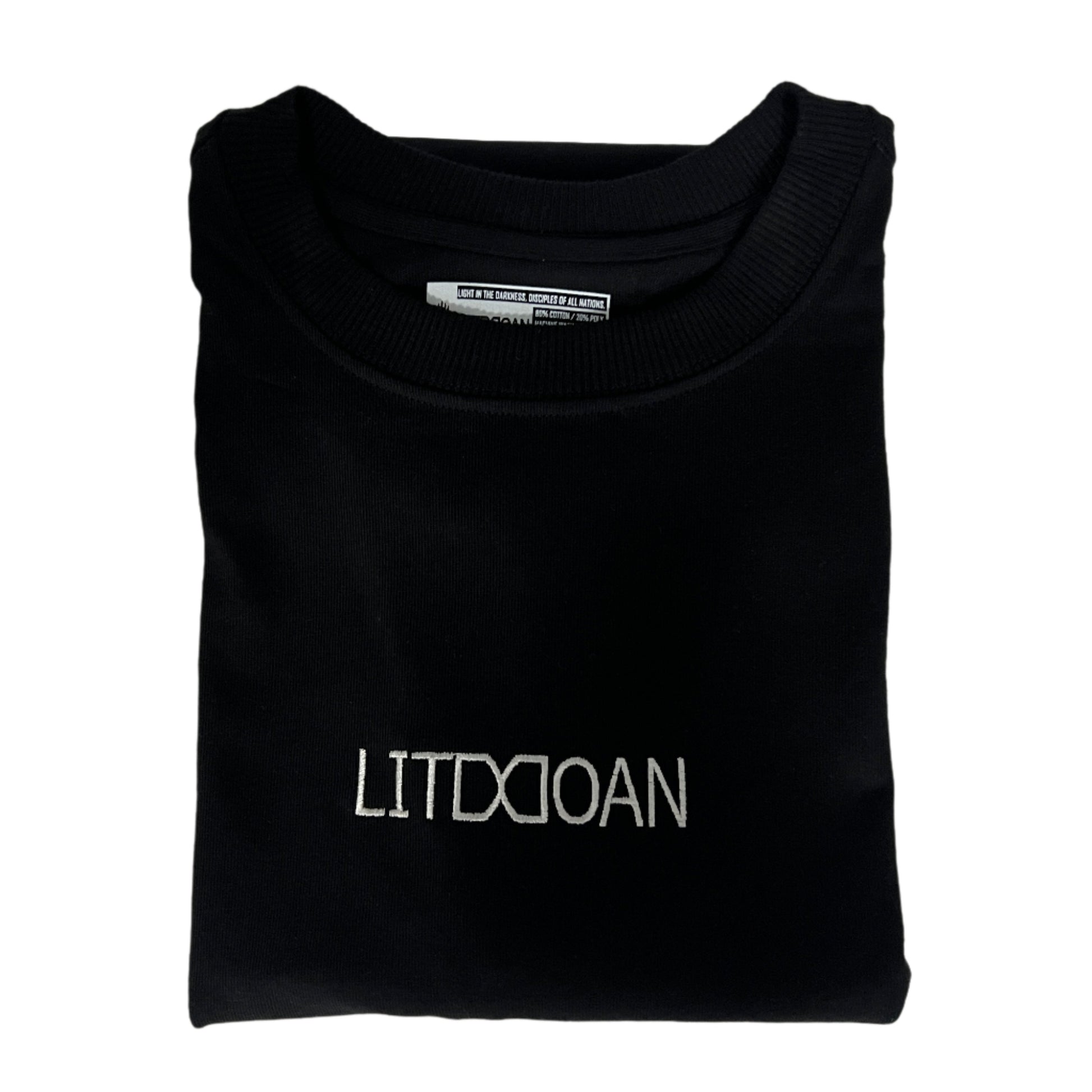 Folded black supper heavyweight tee with 'LITDDOAN' branding on a light white background