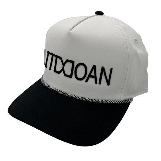 White and black cap with text on a light gray background